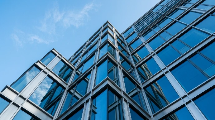 Modern corporate building — ELVI Partners supply chain advisory Belgium